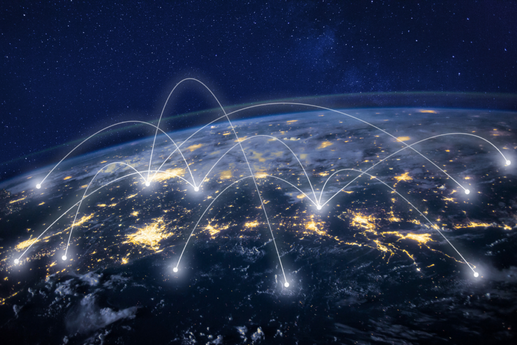 Digital world map with interconnected lines linking continents, representing a global trade network and international logistics connectivity.